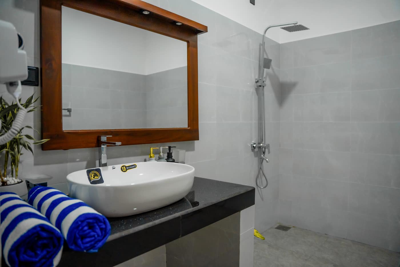 The shower and basin in one of the private bathrooms